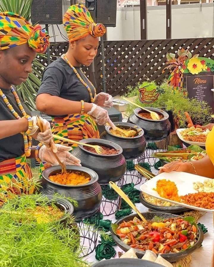 Outdoor garden buffet with assorted Nigerian dishes