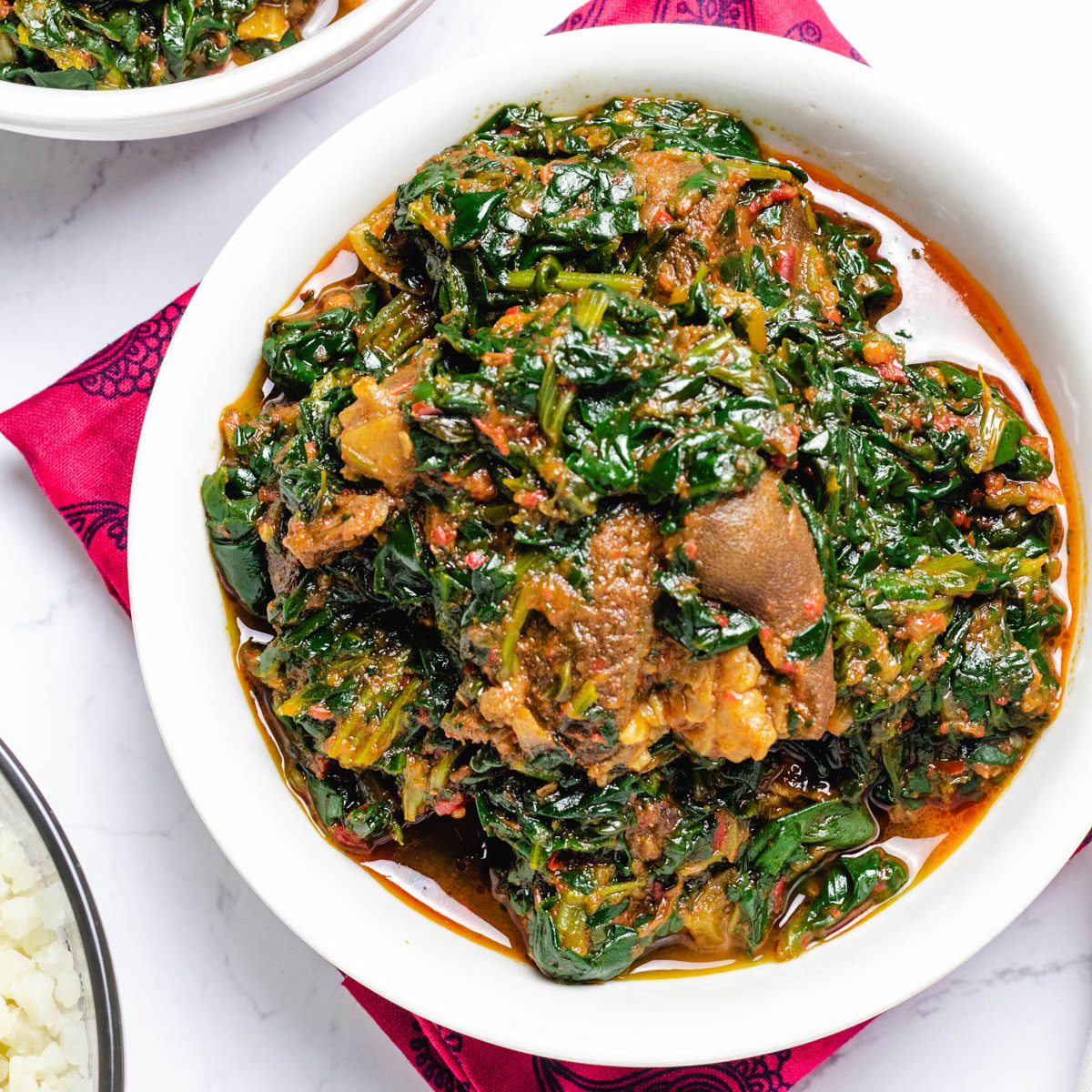 Efo Riro vegetable soup with assorted meat and pounded yam