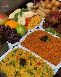 Graduation party catering with jollof rice, suya, small chops